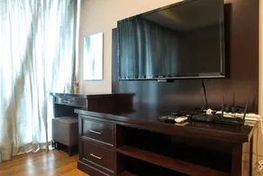 Elegant 1BR Kemang Village Apartment By Travelio - Image 4
