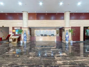 Huajian Hotel - Image 5