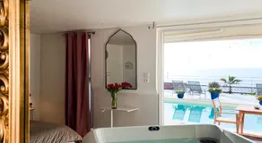 LES SUITES LOVE 1 SPA VUE MER PISCINe - Image 4