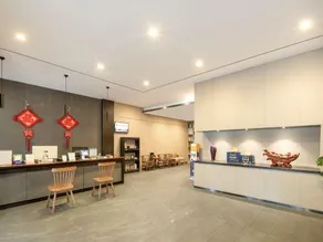 Yijia Baiyun Hotel - Image 4