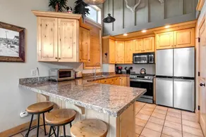 Walk to Ski Slopes Trails Charming 3-Bedroom Private Home with Private Hot Tub Two Gas Fireplaces and AC PEA-1260 by KBM Resorts - Image 3