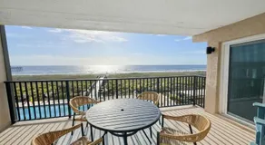 Ocean-view condo with a scenic balcony & W/D - pool and beach access - Image 5