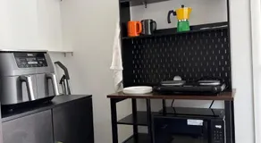 Private minimalist studio with patio and parking - Image 3