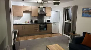 Cozy 2 Bed Apartment with Balcony Etihad Views, Steps from Coop Live - Image 3