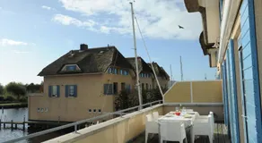 Peaceful boathouse located in a water activity-rich area - Image 5