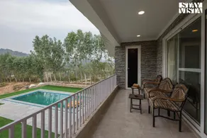 StayVista at Caramel @ Golden Lark w/ Wi-Fi, Pool & Lawn - Image 5