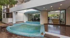 SaffronStays Vedanta - 5BR luxury villa with plunge pool, game zone, lawn & Tungarli Lake nearby - Image 2