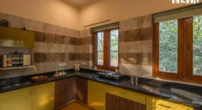 StayVista's Wildwood Canopy - Forest-View, Pet-Friendly Villa with Lawn & Indoor-Outdoor Games - Image 4