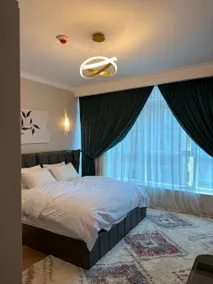شقة فندقية فاخرة بإطلالة ساحرة على النيل ولاهرامات - Image 2