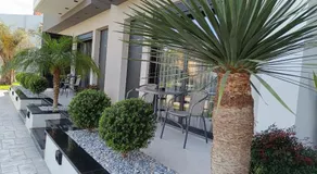 Oikos 9 Rooms and Suites - Image 5
