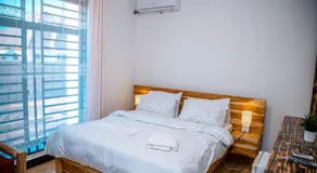 The Home Hotel and Apartments - Image 2