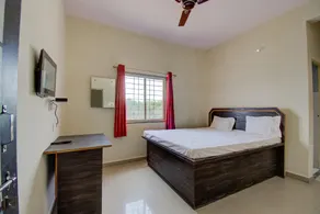 San Tower Hotel by OYO Rooms - Image 1