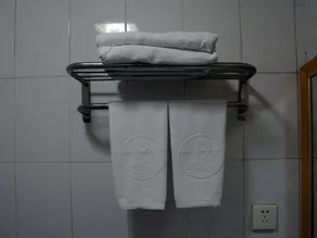 Huxin Hotel - Image 4