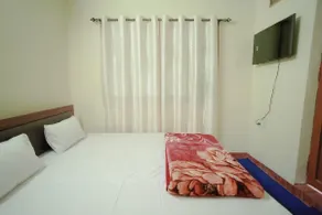 private bedroom at naukuchiyatal - Image 2