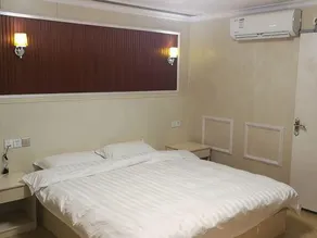 Shunda Business Inn - Image 4