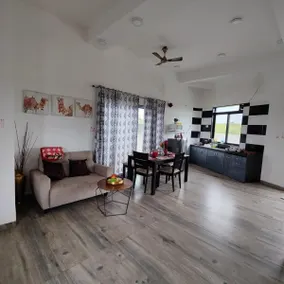 Spanish-inspired 2 BHK White Villa - Brinla Homes - Image 4