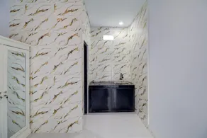 Hotel O near Mangusada Hospital formerly Rare Home Cozy Stay Premier 2 - Image 5