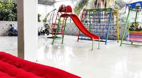 Pertiwi Homestay Near Museum Angkut Batu Mitra RedDoorz - Image 4
