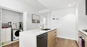 Elegant coastal living near shops and surf beach - Image 5