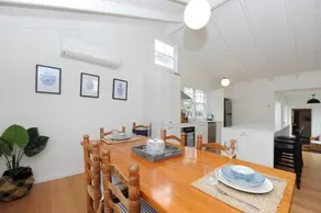 White Shell Cottage - Woodfire & Beachfront - Image 1