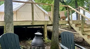 Enchanting Mountain Glamping Tents with Elevated Decks and Fire Pit Near Gentry, AR - Image 3