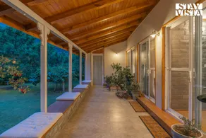 StayVista at Mayflower Aramgarh in middle of Orchards with Lawn, Bonfire, BBQ - Image 4