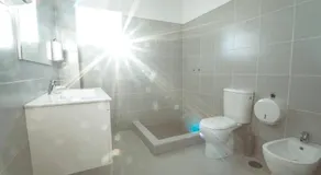 Modern apartment in Estói with shared pool. - Image 1