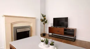 Stylish 3BR Stay with Garden & Parking - Image 2
