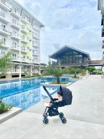 Amani Grand Resort Residences by JC SpaceRentals balcony pool view, Ground floor, 5mins from airport, free WIFI, NETFLIX - Image 5