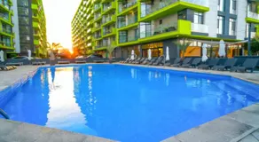 Azizi Luxury Suite Apartments - Beach Pool & Spa Resort Piscina - Image 4