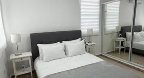 StayDelRom Cozy 3BR Home 8 Min to Airport 5 to Mall of San Juan 2 to Restaurants - Image 2