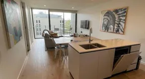 Lovely CBD two bedroom apartment free parking gym and sauna - Image 3