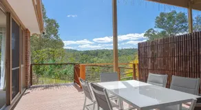 Peaceful Bushland Retreat with Treetop Hills Views - Image 5