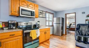 Charming Basement Stay with Workspace AC & Fire Pit - Image 3