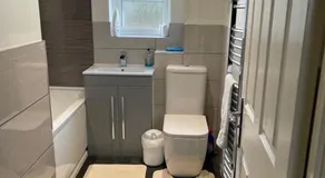 Double bedroom in a residential home with parking - Image 2