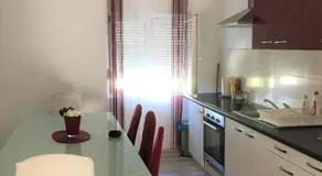 Apartments Benic with a heated pool - Image 5