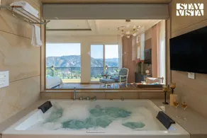 StayVista at Chestnut Manor with Sky Jacuzzi & Steam Room - Image 4