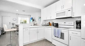 Renovated 2BR Home - Hot Tub, Gym & Beach Nearby - Image 5