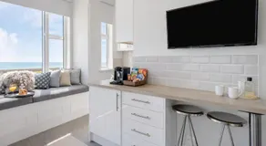 Beachfront Studio Direct Sea Views Air Conditioning The Compact Coastal Crib - Image 3