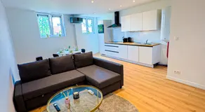Modern 1BR & 1LR Apartment, 10 min Walk to City Center - Image 2