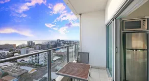 High-Rise Modern Oasis with Pool and City Views - Image 3