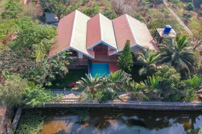 Aranyam Villa by StayVista with Modern wooden interiors, Kidszone, Indoor games & plunge pool - Image 5