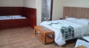 Pousada Café em Flor -Quarto Hidromassagem - Image 2
