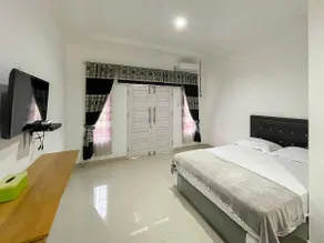Hotel Lucky 21 Syariah Mitra RedDoorz - Image 2