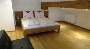 Gemütliche Dachgeschosswohnung mit Balkon & Garten - Image 2