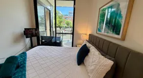 Luxe 2BR Executive Apartment Kingston Pool Parking WiFi BBQ Wine - Image 2