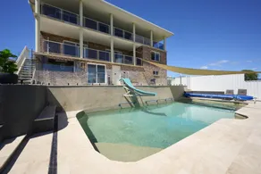 Coastal Retreat with Pool and Balcony Views - Image 3