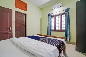 SPOT ON 813558 Soorya Tourist Homes - Image 1