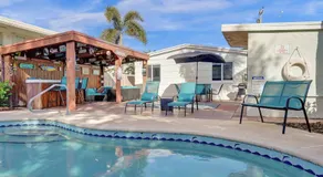 Beach Family Tiki Villa Walk to Beach Heated Pool - Image 4