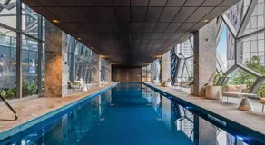 Chic 2-Bed Melbourne CBD Apartment with Pool  Sauna - Image 2
